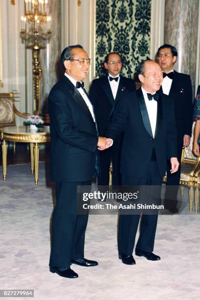 Philippines President Fidel Ramos and Japanese Prime Minister Kiichi Miyazawa are seen at the Akasaka States Guest House on March 10, 1993 in Tokyo,...