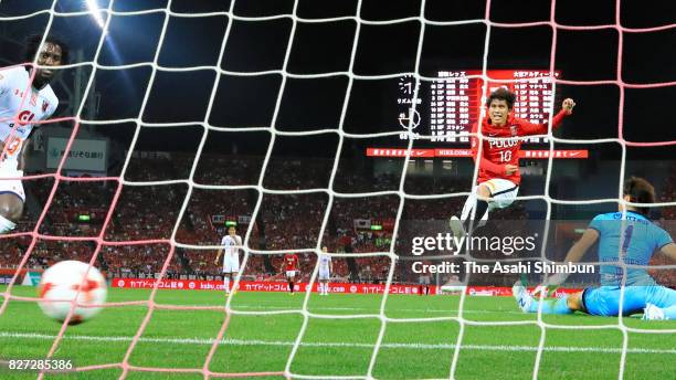 Yosuke Kashiwagi of Urawa Red Diamonds scores his side's second goal during the J.League J1 match between Urawa Red Diamonds and Omiya Ardija at...