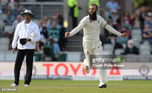 Moeen Ali of England celebrates after dismissing Theunis de Bruyn of South Africa during the fourth day of the 4th Investec Test match between...