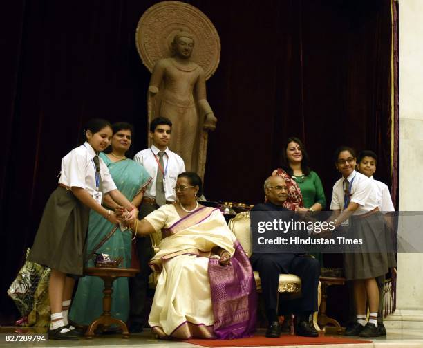 St Raksha President Ram Nath Kovind and his wife Savita Kovind celebrate the ...