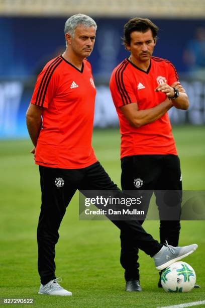 Jose Mourinho, Manager of Manchester United and Rui Faria, Manchester United assistant manager look on during a training session ahead of the UEFA...