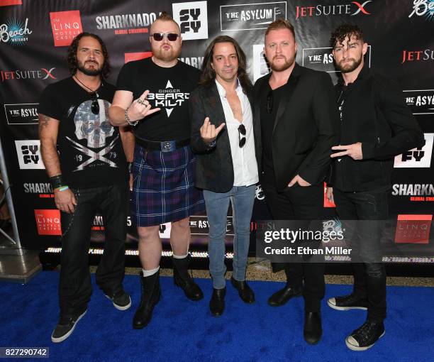 Singers Jonny Williams, Jimmy Denning, Chris Cicchino, Gareth Richards and Tommy Sherlock of the vocal group Tenors of Rock attend the premiere of...