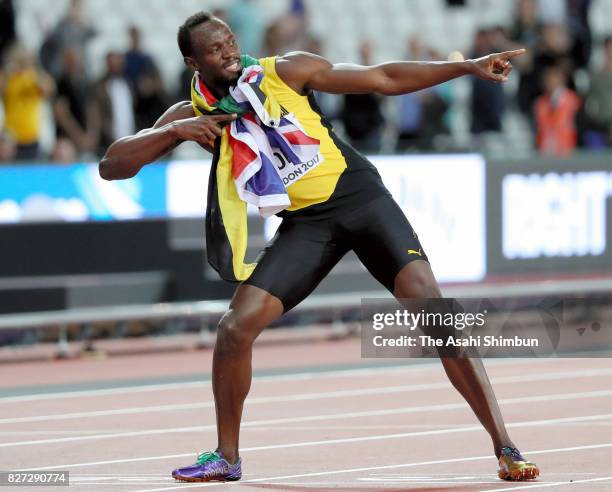 Usain Bolt of Jamaica poses after winning the bronze medal in the Men's 100m final during day two of the 16th IAAF World Athletics Championships...