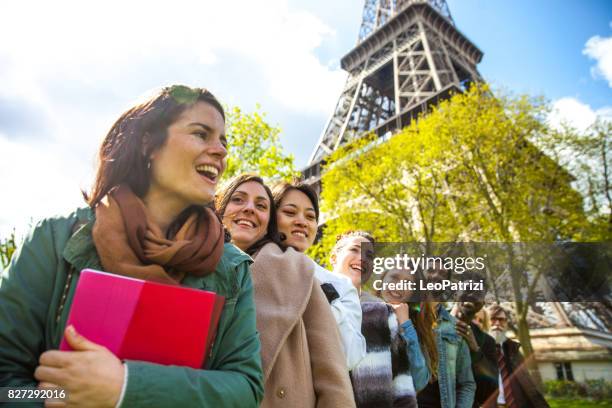 school trip in paris - outdoor lessons - tour eiffel - field trip stock pictures, royalty-free photos & images