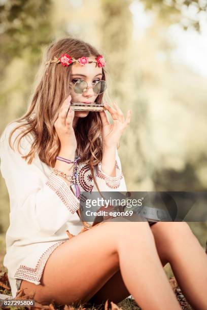 hippie woman - harmonica stock pictures, royalty-free photos & images