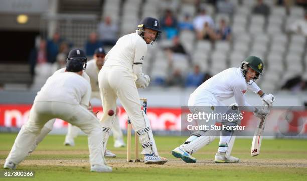 South Africa batsman Duanne Olivier is caught by Ben Stokes at slip as Jonny Bairstow looks on off the bowling of Moeen Ali during day four of the...