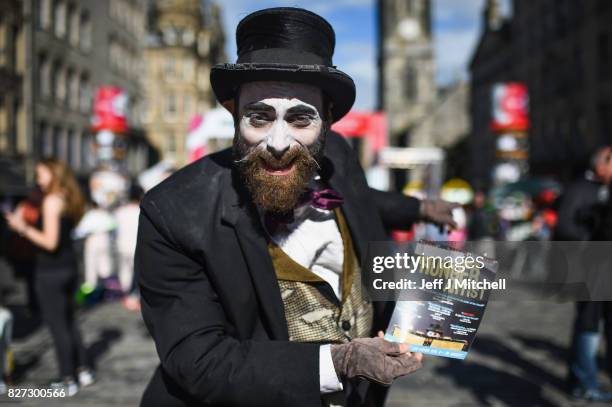 Edinburgh Festival Fringe entertainers perform on the Royal Mile on August 7, 2017 in Edinburgh, Scotland. This year marks the 70th anniversary of...