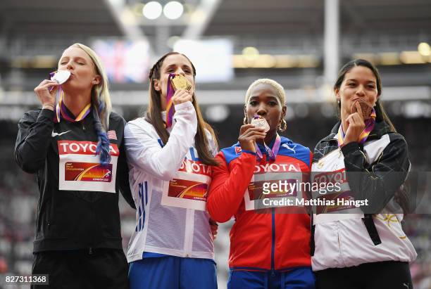 Sandi Morris of the United States, silver, Ekaterini Stefanidi of Greece, gold, Robeilys Peinado of Venezuela, bronze, and Yarisley Silva of Cuba,...