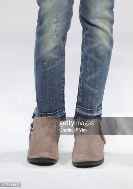 Young model walks the runway for ag kids collection during petitePARADE at Children's Club at Jacob Javitz Center on August 7, 2017 in New York City.