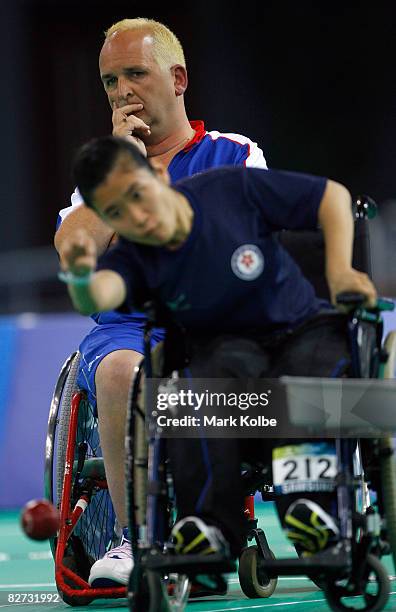 Nigel Murray of Great Britain watches on as he competes in the gold medal Mixed Individual BC2 Boccia match against Hoi Ying Karen Kwok of Hong Kong...