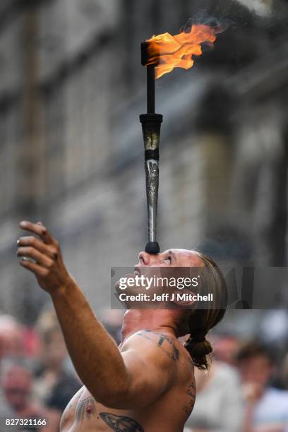 Edinburgh Festival Fringe entertainers perform on the Royal Mile on August 7, 2017 in Edinburgh, Scotland. This year marks the 70th anniversary of...