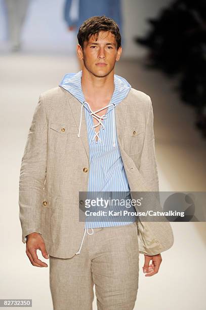 Model walks the runway at the Perry Ellis 2009 fashion show during Mercedes-Benz Fashion Week at The Salon in Bryant Park on September 5, 2008 in New...