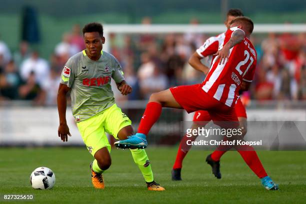 Dennis Wegner of Steinbach challenges Nikolas Nartey of Kln during the preseason friendly match between TSV Steinbach and 1. FC Koeln at...