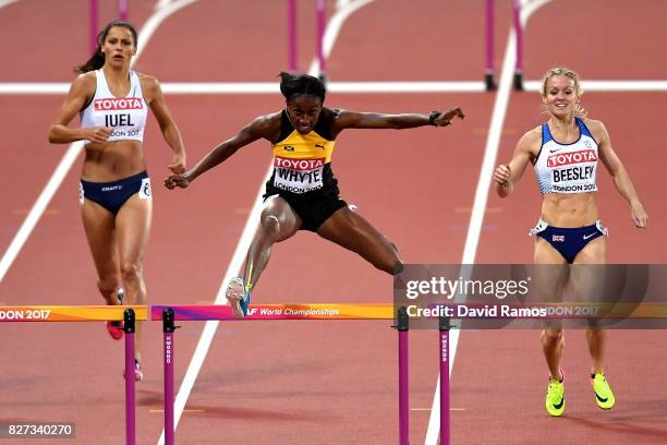 Amalie Iuel of Norway, Rhonda Whyte of Jamaica and Meghan Beesley of Great Britain compete in the Women's 400 metres hurdles heats during day four of...