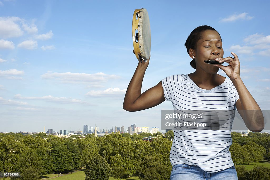 Portrait of woman playing musical instruments