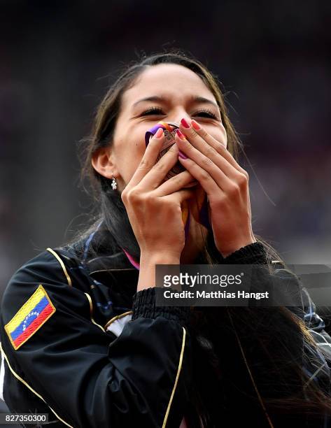 Robeilys Peinado of Venezuela kisses her bronze medal for the Women's Pole Vault during day four of the 16th IAAF World Athletics Championships...