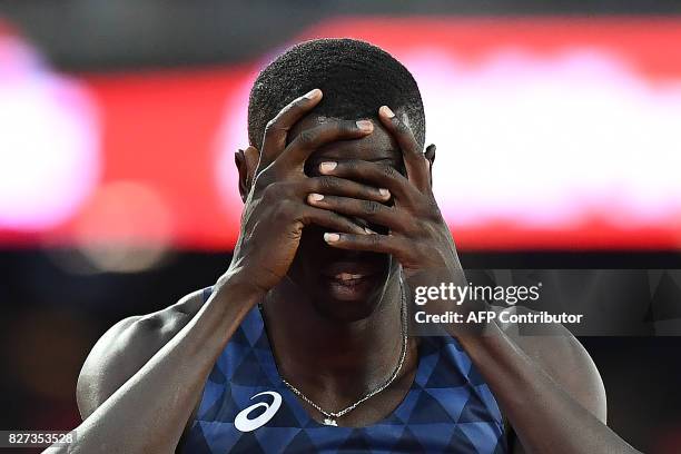 France's Mamadou Kasse Hann reacts after failing to qualify from the semi-final of the men's 400m hurdles athletics event at the 2017 IAAF World...