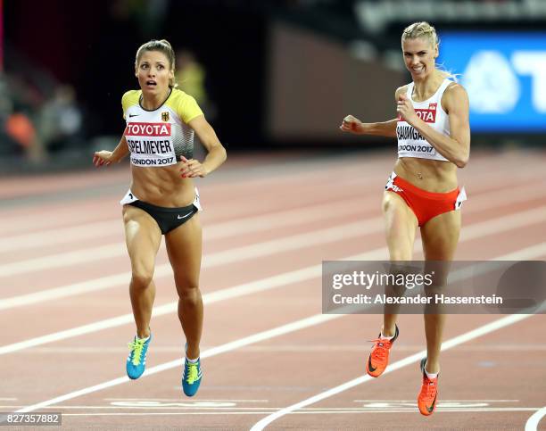 Ruth Sophia Spelmeyer of Germany and Iga Baumgart of Poland compete in the Women's 400 metres semi finals during day four of the 16th IAAF World...