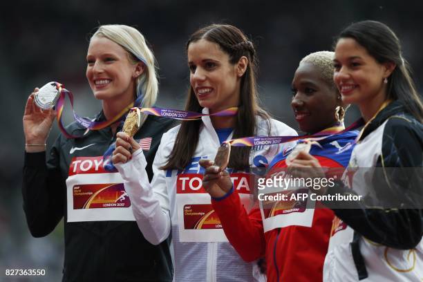 Silver medallist US athlete Sandi Morris , gold medallist Greece's Ekateríni Stefanídi and bronze medallists Venezuela's Robeilys Peinado and Cuba's...