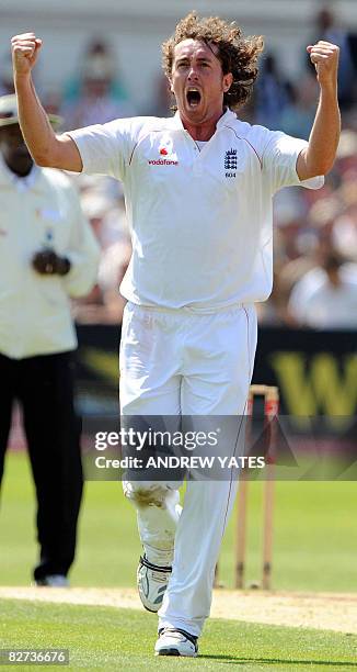 England cricketer Ryan Sidebottom celebrates after taking the wicket of New Zealand's Gareth Hopkins during the fourth day of the third test match at...