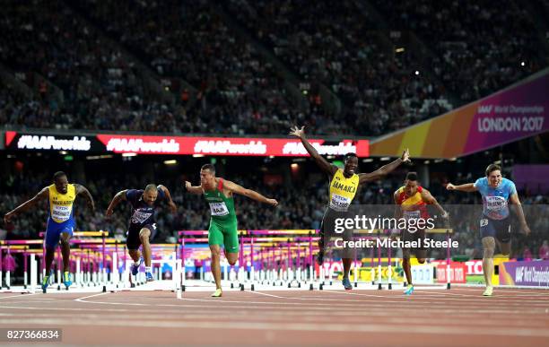 Omar McLeod of Jamaica crosses the finishline to win the Men's 110 metres hurdles final during day four of the 16th IAAF World Athletics...