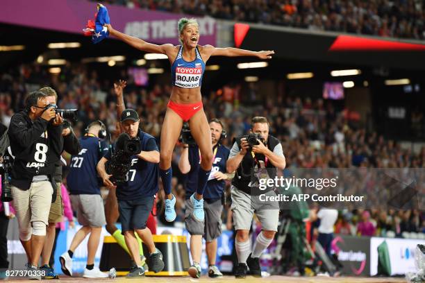 Venezuela's Yulimar Rojas celebrates her victory in the final of the women's triple jump athletics event at the 2017 IAAF World Championships at the...