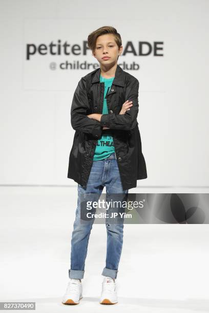 Young model walks the runway for Diesel Kid collection during petitePARADE at Children's Club at Jacob Javitz Center on August 7, 2017 in New York...