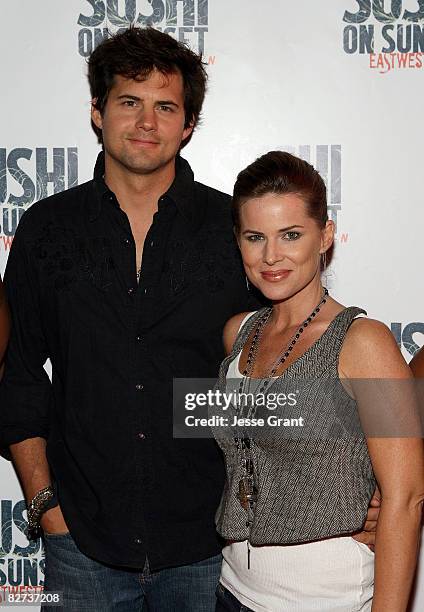 Actors Kristoffer Polaha and Julianne Morris attend the Sushi On Sunset East/West Fushion grand opening celebration held at Sushi On Sunset East/West...