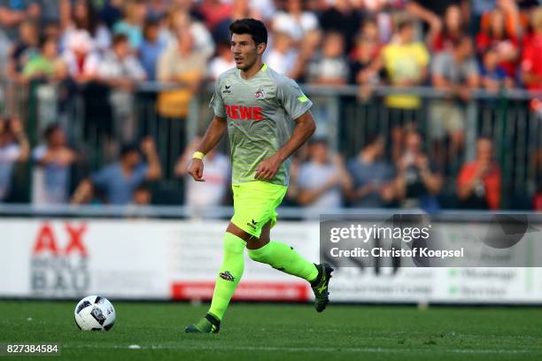 Milos Jojic of Kln runs with the ball during the preseason friendly match between TSV Steinbach and 1. FC Koeln at Sibre-Sportzentrum Haarwasen on...