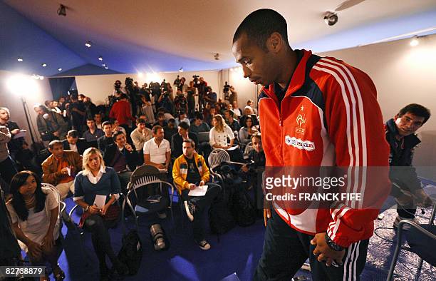 French national football team's captain and forward Thierry Henry leaves a press conference on September 9, 2008 in Clairefontaine, outside Paris on...