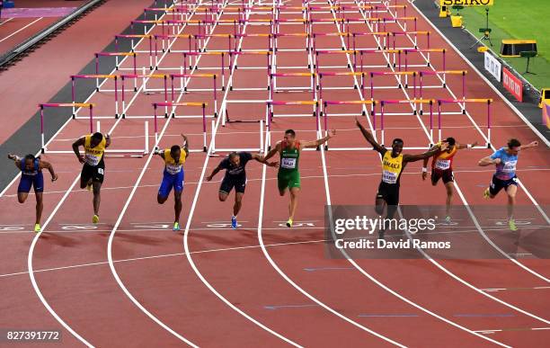Omar McLeod of Jamaica crosses the finishline to win the Men's 110 metres hurdles final during day four of the 16th IAAF World Athletics...