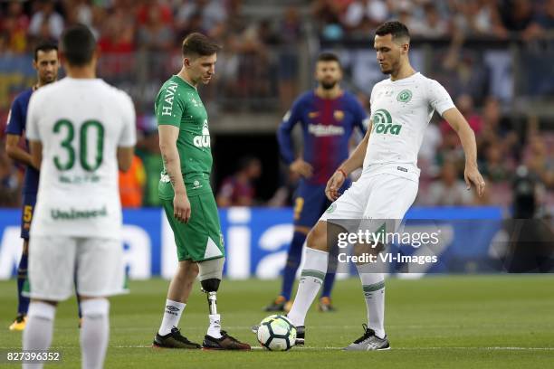 Goalkeeper Jackson Follmann of Associacao Chapecoense de Futebol, Neto of Associacao Chapecoense de Futebol kick off the match. They are two of three...