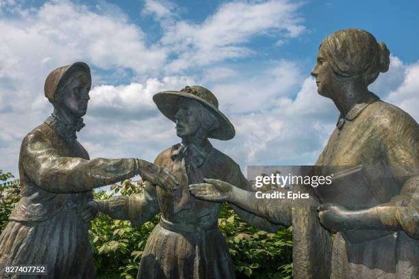 Statue at Seneca Falls depicting the first meeting of feminist activists Susan B. Anthony and Elizabeth Cady Stanton after they attended an anti...