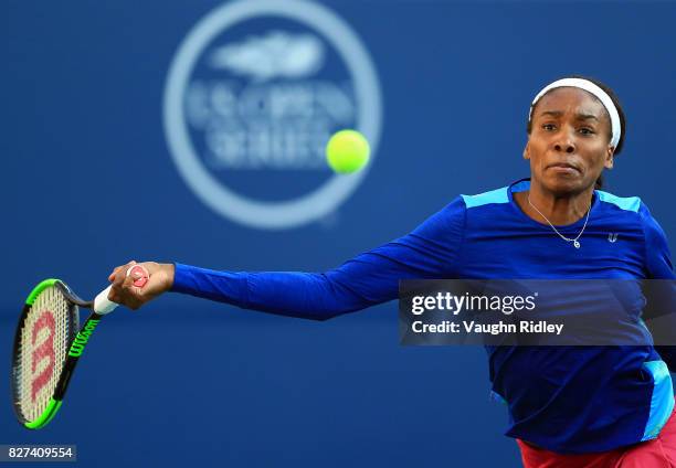 Venus Williams of the United States plays a shot against Irina-Camelia Begu of Romania during Day 3 of the Rogers Cup at Aviva Centre on August 7,...
