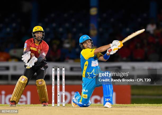 In this handout image provided by CPL T20, Kamran Akmal of St Lucia Stars hits 6 during Match 6 of the 2017 Hero Caribbean Premier League between St...