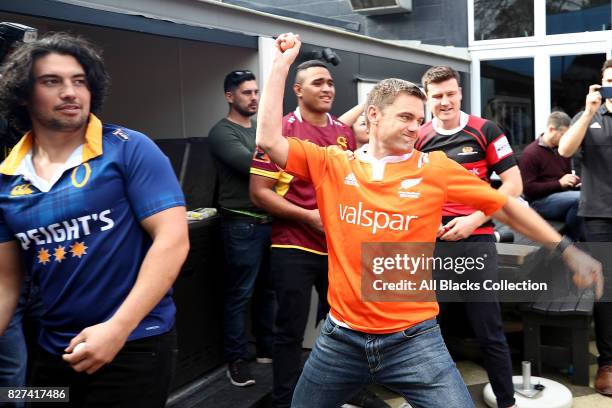 Referee Nick Bryant throws a paint bomb at a map of New Zealand during the Mitre 10 Cup Season Launch at the College Rifles Rugby Union Football &...