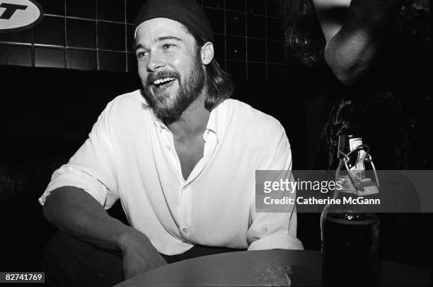Actor Brad Pitt poses for a photo during the party for the premiere of the film "Johnny Suede" at Tilt on August 11, 1992 in New York City, New York