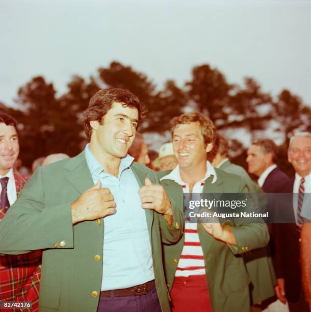 Fuzzy Zoeller presents Masters Winner Seve Ballesteros with his first green jacket after the 1980 Masters Tournament at Augusta National Golf Club on...