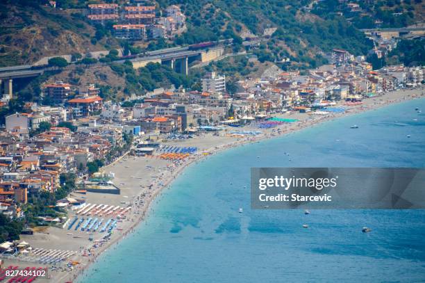 sicilian coastline near taormina - giardini naxos, italy - naxos sicily stock pictures, royalty-free photos & images