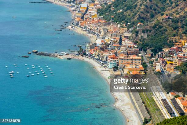sicilian coastline near taormina - giardini naxos, italy - naxos sicily stock pictures, royalty-free photos & images