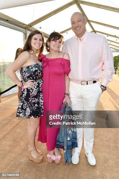 Chelsea Cohn, Lisa Pevaroff-Cohn and Gary Cohn attend Sixth Annual Hamptons Paddle and Party for Pink Benefitting the Breast Cancer Research...