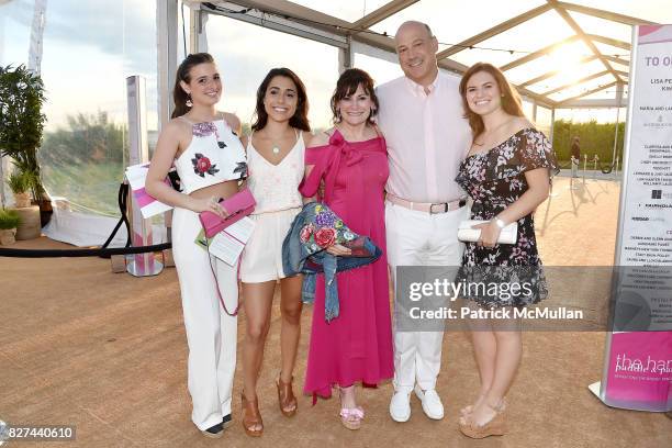 Syndey Munro, Gabby Anselmi, Lisa Pevaroff-Cohn, Gary Cohn and Chelsea Cohn attend Sixth Annual Hamptons Paddle and Party for Pink Benefitting the...