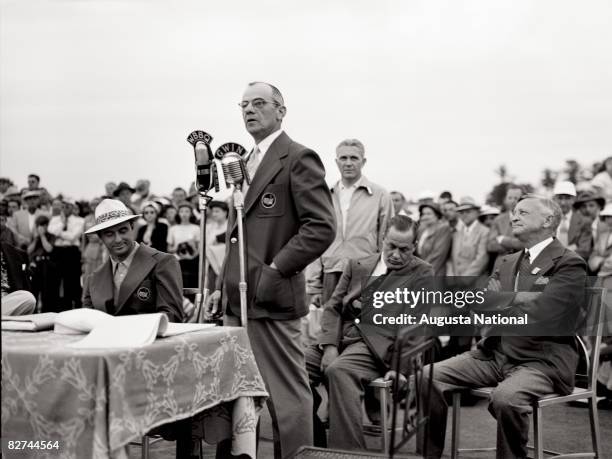 Clifford Roberts talks at the Presentation Ceremony while Sam Snead and Bobby Jones listen during the 1949 Masters Tournament at Augusta National...