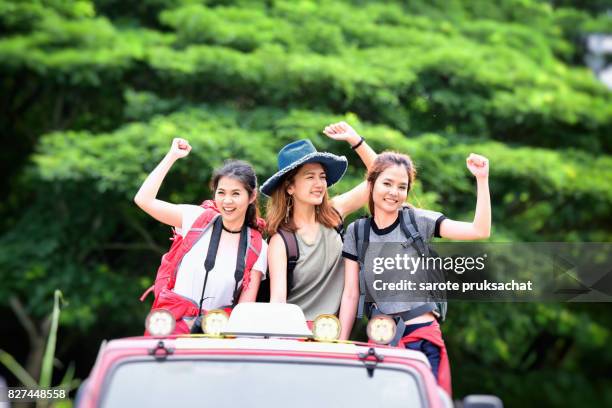 group of young asian camper enjoy adventure travel, forest park outdoors . holiday , vacation , summer concept . - campfire stories stock pictures, royalty-free photos & images