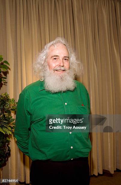 senior man with unwieldy white hair smiling  - arizona christmas stock-fotos und bilder