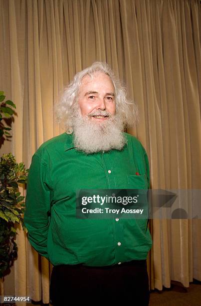 senior man with unwieldy white hair smiling  - santa beard stock pictures, royalty-free photos & images