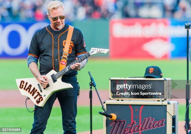 James Hetfield of Metallica performs the National Anthem during the regular season game between the San Francisco Giants and the Chicago Cubs on...