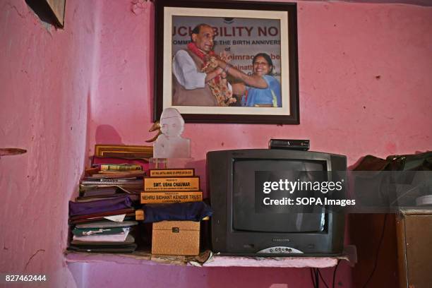 Colour television along with a few awards and belongings of Liberated manual scavenger, Usha Chaumar pictured inside her house. According to United...