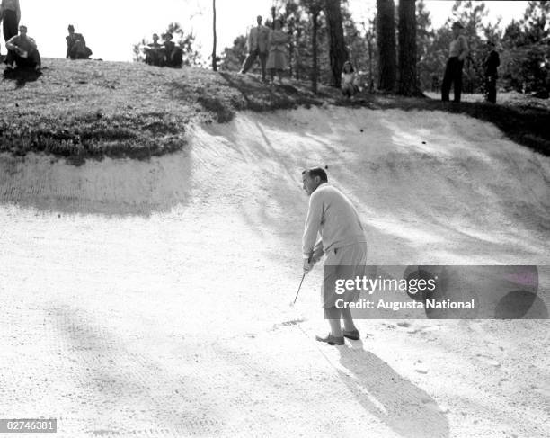 Gene Sarazen pitches from bunker during a Masters Tournament at Augusta National Golf Club in the 1930s in Augusta, Georgia.