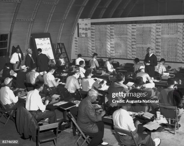 1950s: The media work from the press quonset hut during the Masters Tournament at Augusta National Golf Club during the 1950s and 1960s in Augusta,...